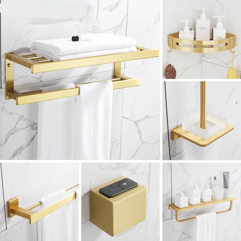 Collage of gold bathroom shelves and accessories on a marble wall.