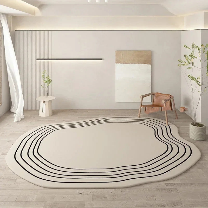 Beige rug with black lines in a modern room with a chair and plant.