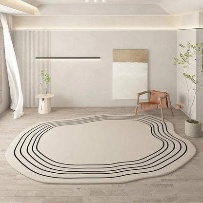 Beige rug with black lines in a modern room with a chair and plant.