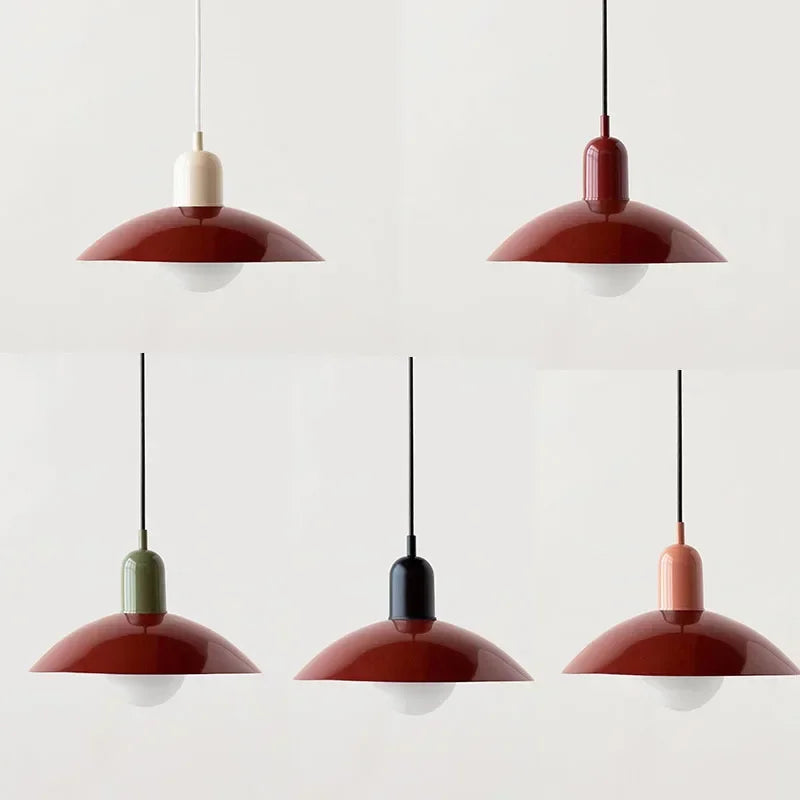 Set of five pendant lights with red and white design on a light gray background