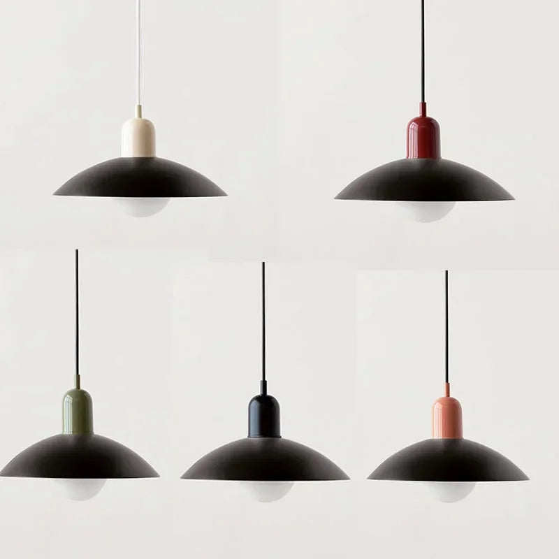 Set of five pendant lights with various colored accents on a white background