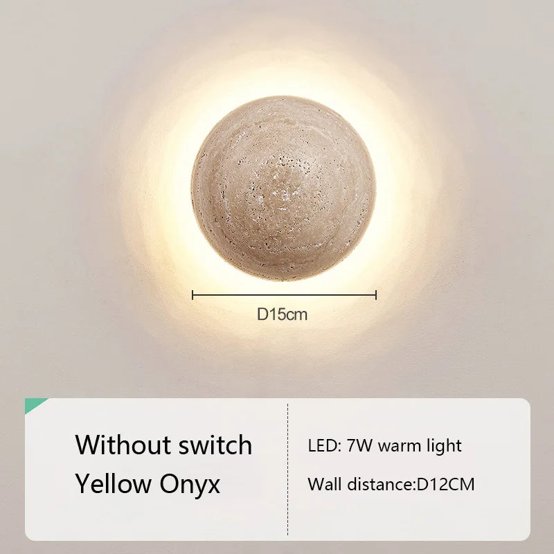 Round wall light fixture with dimensions and feature details on a neutral background