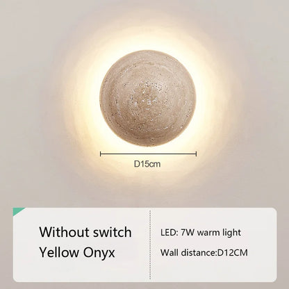 Round wall light fixture with dimensions and feature details on a neutral background